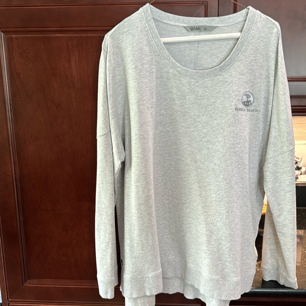 Light weight pebble beach logo shirt by Tasc performance